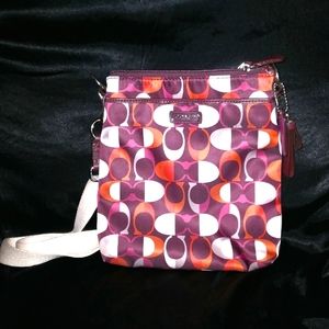 Burgandy coach monogram cross body bag